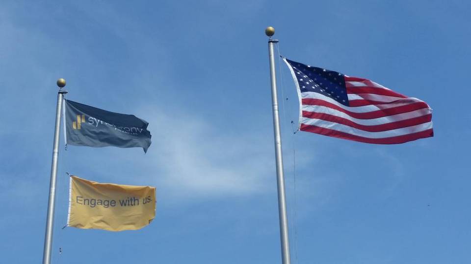 Matthijs Matt van Leeuwen, Jessica Staley, Craig Stout, Synchrony Financial Logo, Interbrand New York, Charlotte, Flag