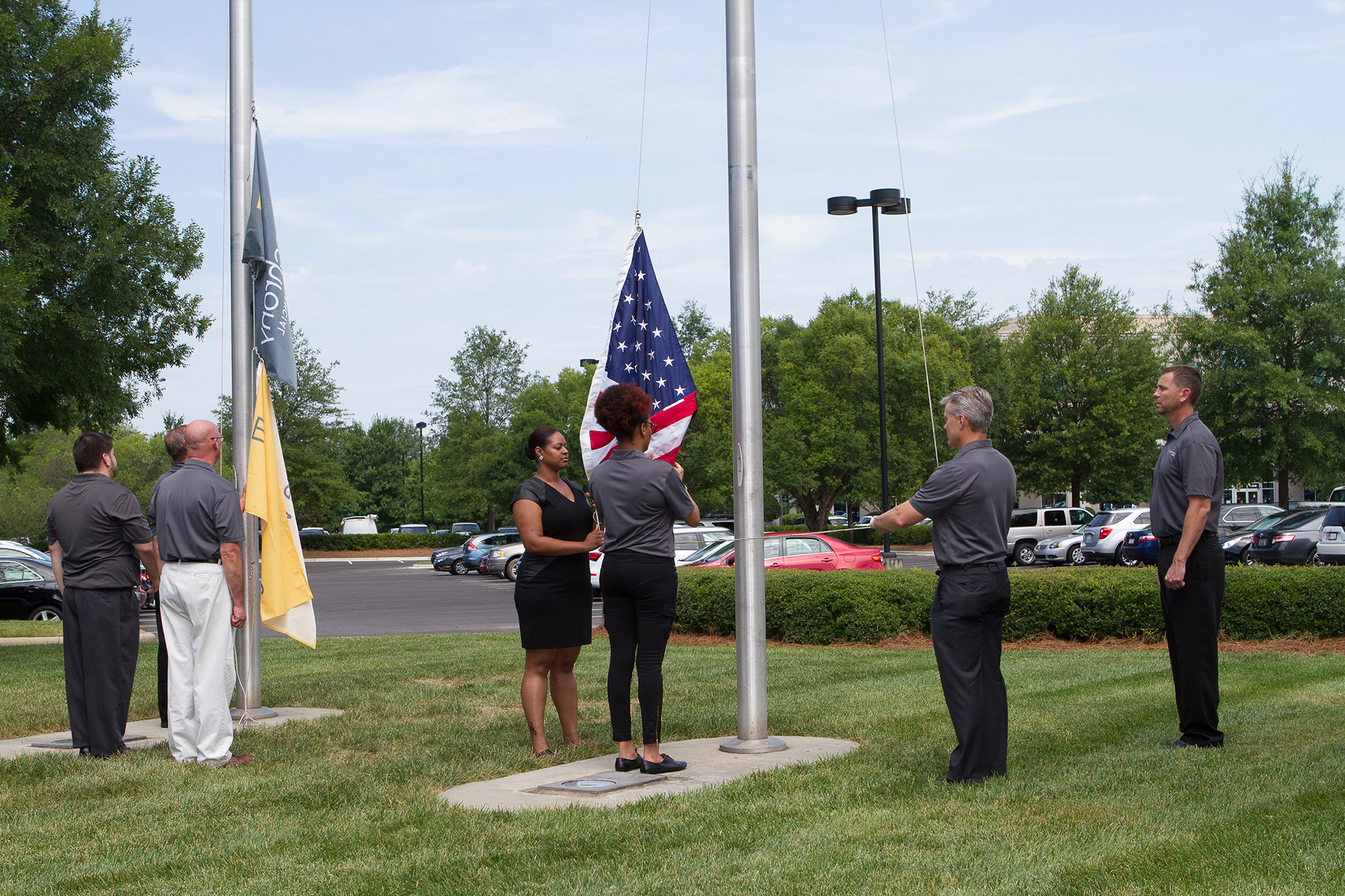 Matthijs Matt van Leeuwen, Jessica Staley, Craig Stout, Synchrony Financial Logo, Interbrand New York, Charlotte Flag